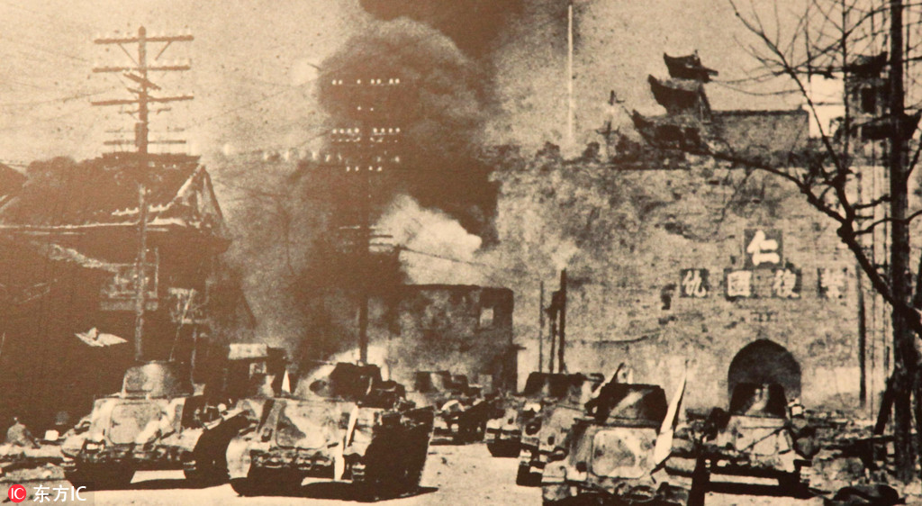 1937年12月13日，侵華日軍部隊進(jìn)攻南京中華門。