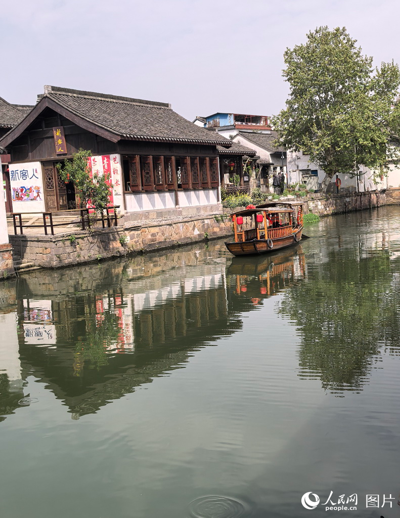 新市千年古鎮(zhèn)迎來春季旅游熱潮 水鄉(xiāng)風情引客來【3】