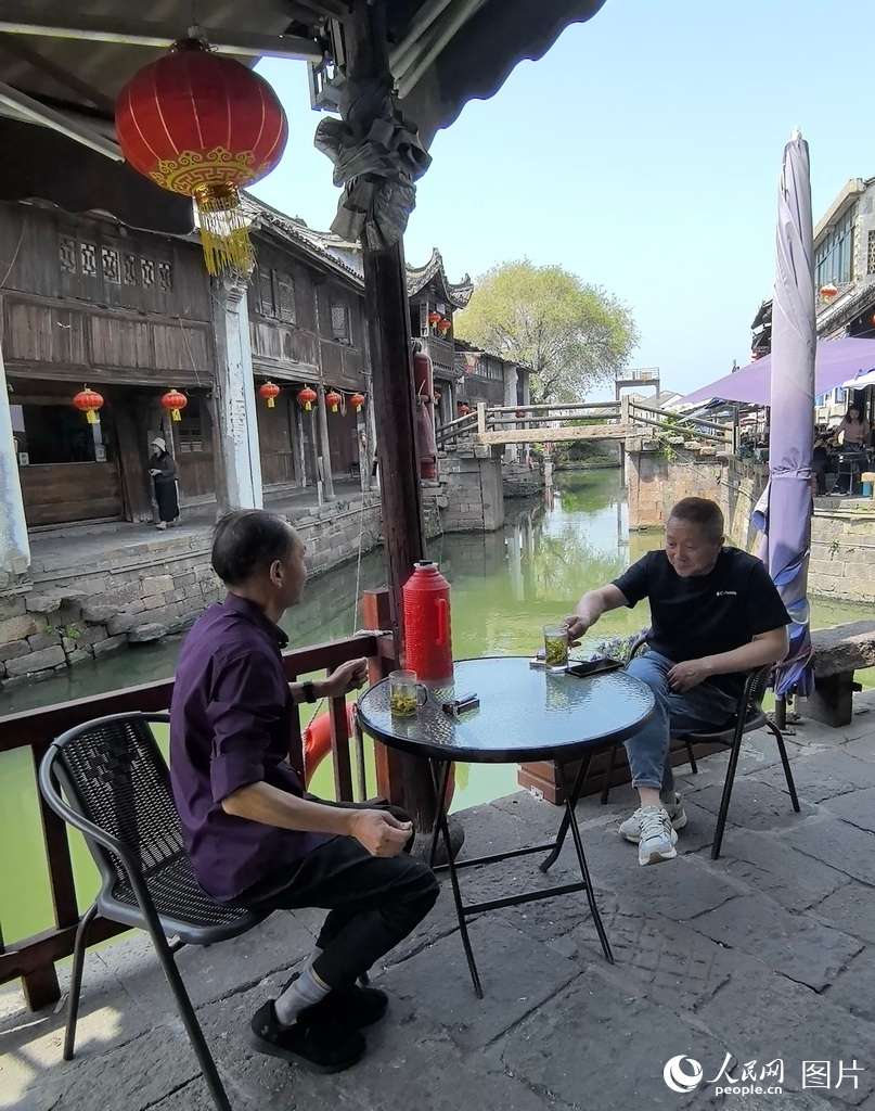 新市千年古鎮(zhèn)迎來春季旅游熱潮 水鄉(xiāng)風(fēng)情引客來【13】